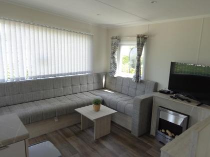 Zu vermieten Mobilheim am Wasser in Holland mit Sandstrand eine Stunde vom Ruhrg