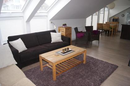 Gemütliche 2-Zimmer-Penthouse-Ferienwohnung in Grömitz an der Ostsee ARKADIA24