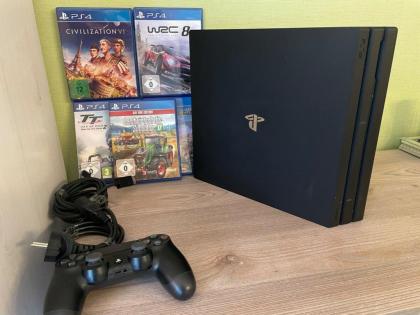 Sony PlayStation 4 Pro 1TB Spielkonsole - Schwarz +5 Spiele