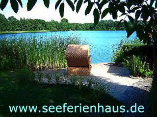 Ferienhaus am Schweriner See in exklusiver Lage an Privatstrand mit Boot, Steg, 